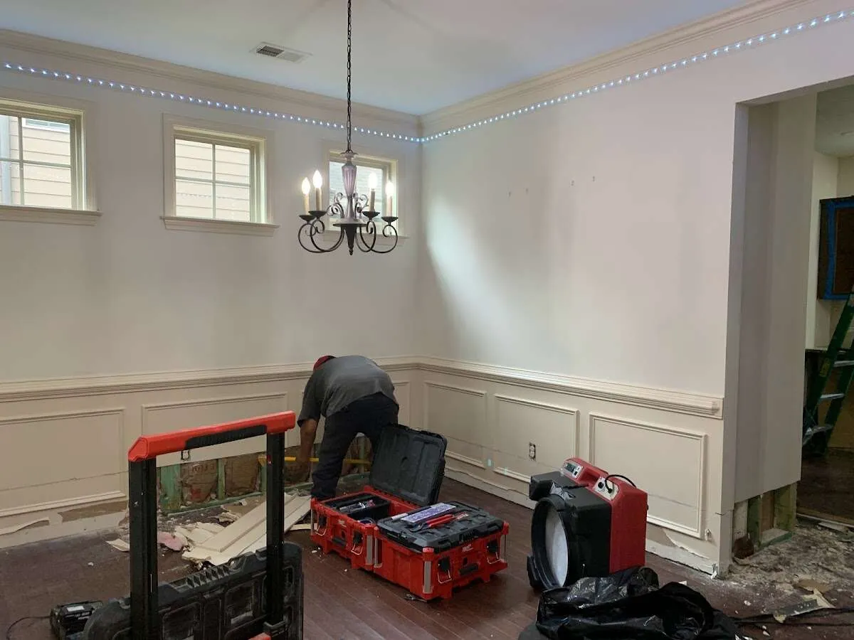 Restoration technician with professional equipment in Jupiter